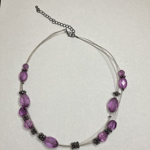 Silver toned wire necklace with purple beads